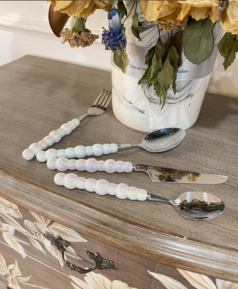 Stainless Steel Four-piece Set With Pearl Handle - Image 2