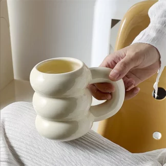 Nordic-Inspired Cream Color Donut Ceramic Mug for Cozy Coffee Moments