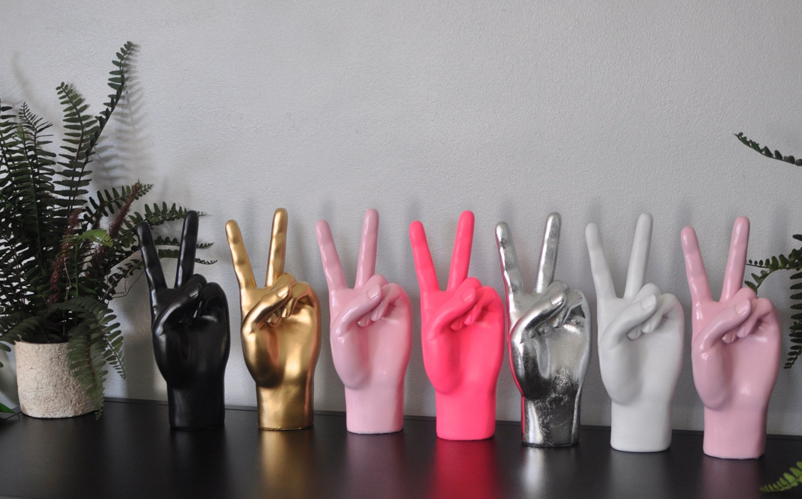 Quirky Peace Gesture Hand Sculptures